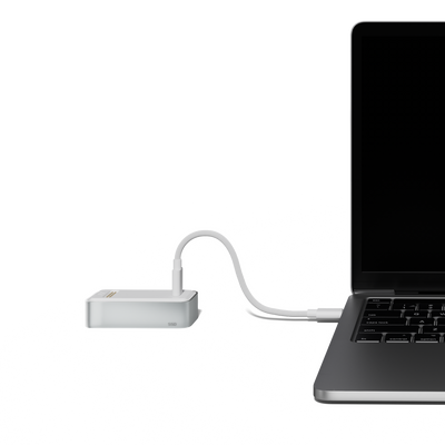 Bricbloc portable SSD connected to laptop for external storage and backup